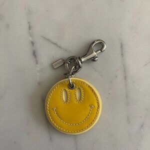 Coach Patent Leather Smiley Face Charm Yellow/White Keychain